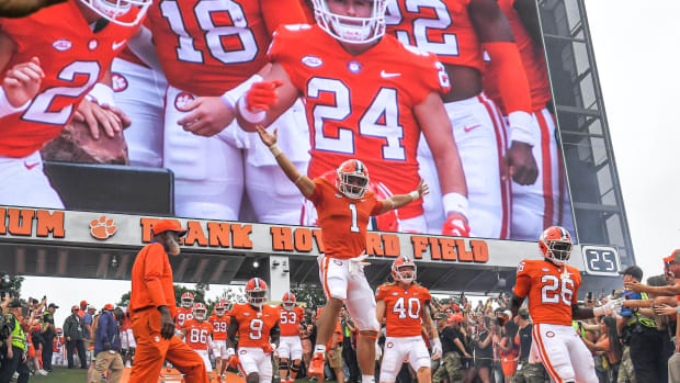 Clemson running back Will Shipley (1) and running back Phil Mafah (26) run down the hill with teammates before the game with Furman at Memorial Stadium in Clemson, South Carolina Saturday, September 10, 2022.
